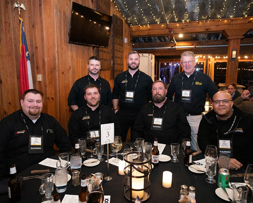 Group of Anderson staff at a table